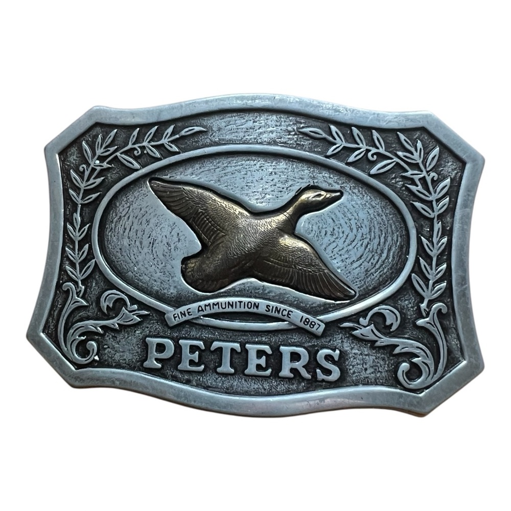 VTG. Peters Ammunition Remington Pewter Belt Buckle with flying duck.